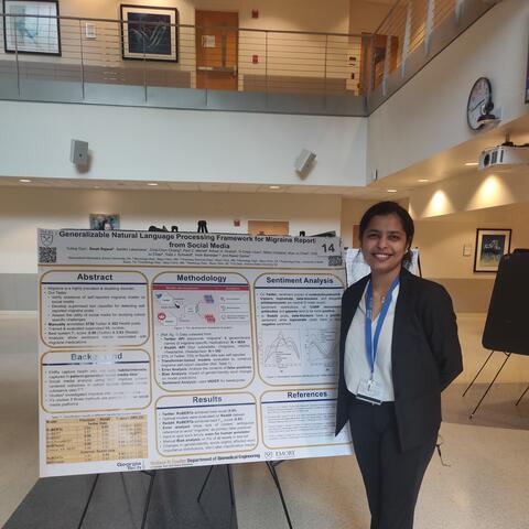 Swati presenting a poster